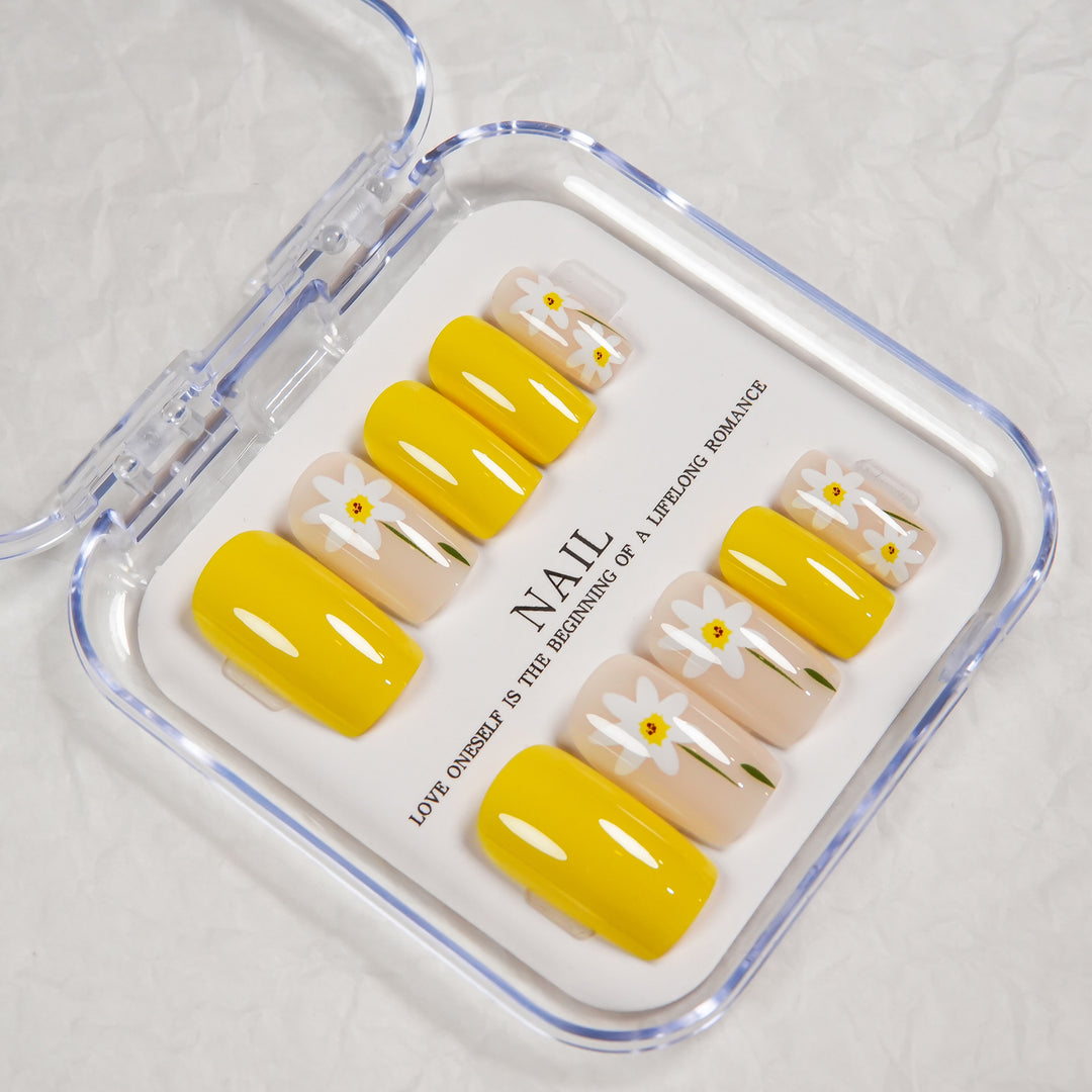 Floral Press-On Nagelset mit gelbem Akzent