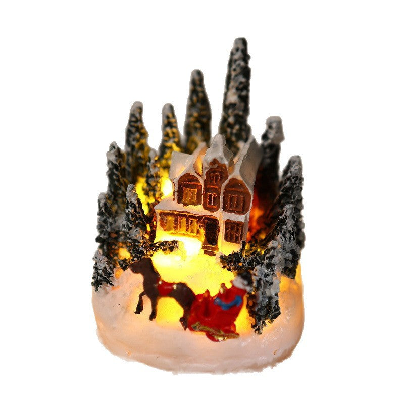 Beleuchtete Weihnachtsdorf-Szene Karnz