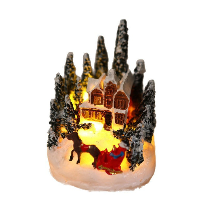 Beleuchtete Weihnachtsdorf-Szene Karnz
