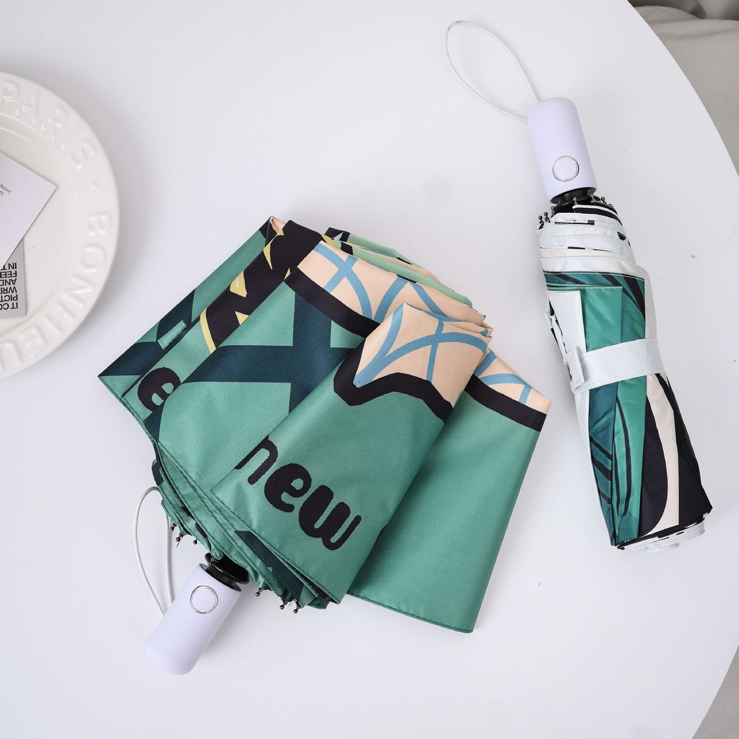 Damen kreativer Faltregenschirm mit grafischem Design Karnz