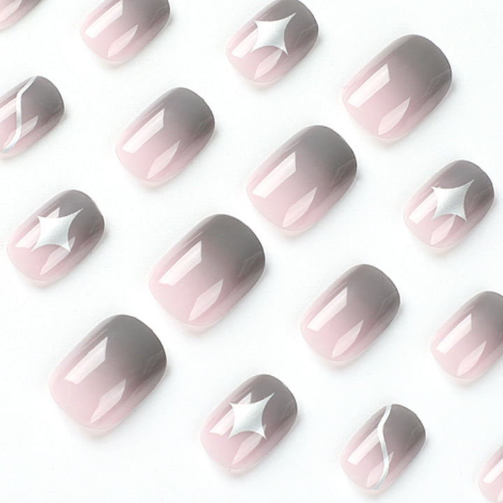 Künstliche Nagelkunst mit elegantem Ombre-Design und reizvollen Akzenten Karnz