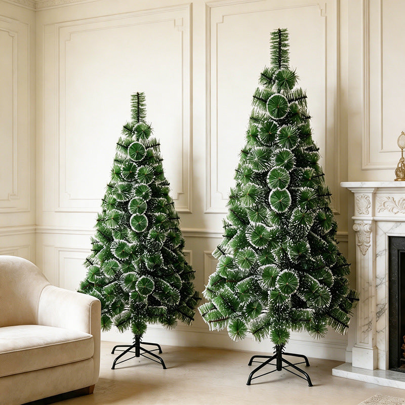 Künstlicher Schnee-bedeckter Weihnachtsbaum