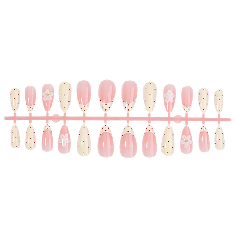 Elegantes Press-On Nail Set mit floralen und gepunkteten Designs Karnz