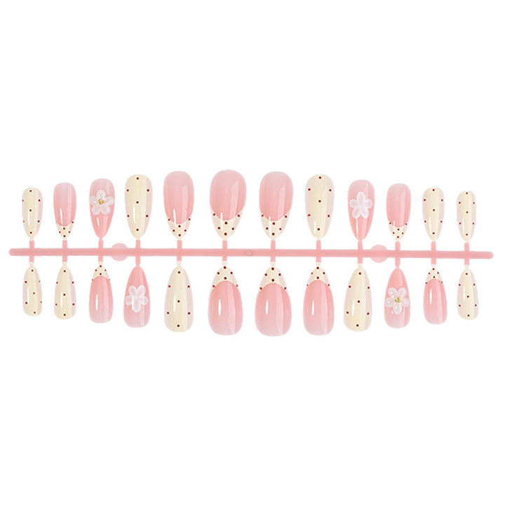 Elegantes Press-On Nail Set mit floralen und gepunkteten Designs Karnz