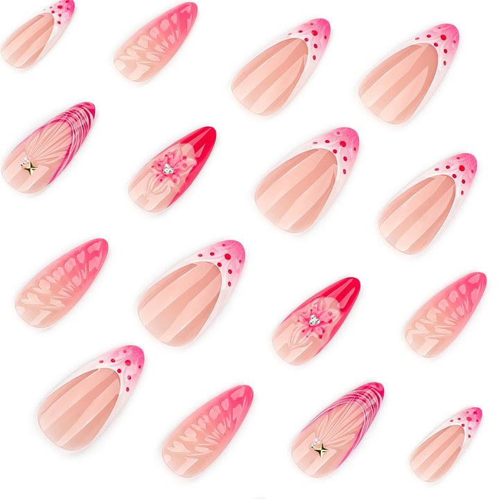 Kunstvolle Stiletto-Nägel mit floralem Design und Glitzerakzenten Karnz