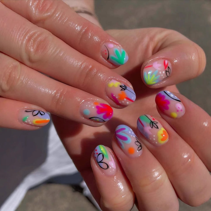 Kreatives Nagelkunstset mit bunten Blumen-Designs Karnz