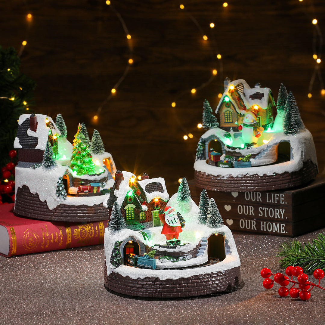 Beleuchtete Weihnachts-Schneekugel-Szene Karnz