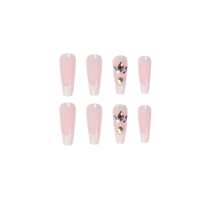 Premium Nagelverlängerungen mit eleganten Designs und Glitzerakzenten Karnz