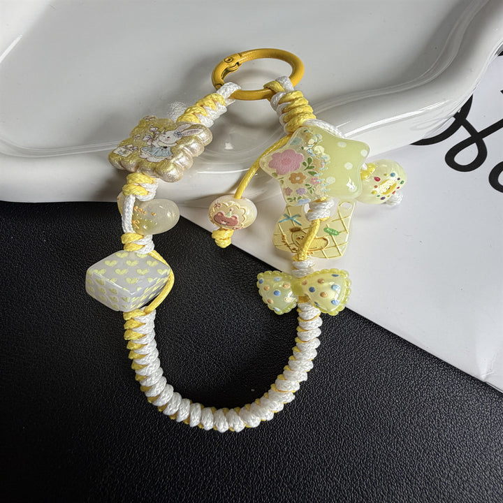 Verspielte Perlencharme-Handyband Karnz 1790134944