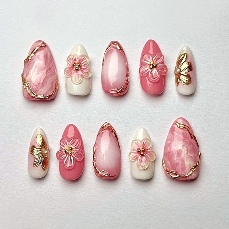 Künstliche Kunstnägel mit floralen und glamourösen Designs Karnz