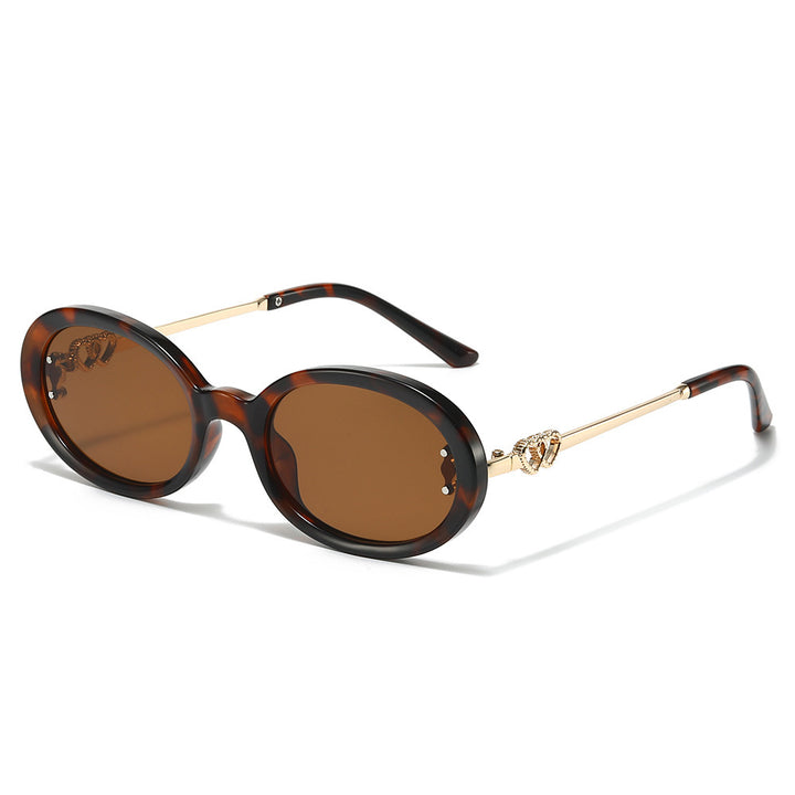 Elegante Shield Sonnenbrille mit dekorativen Metalldetails Karnz