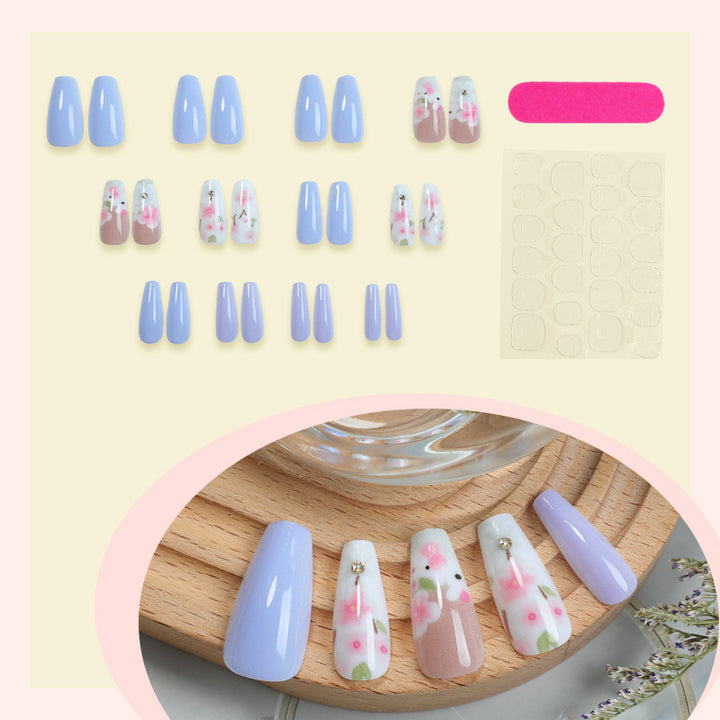 Elegantes Press-On Nagelset mit floralen Akzenten Karnz 1788496046
