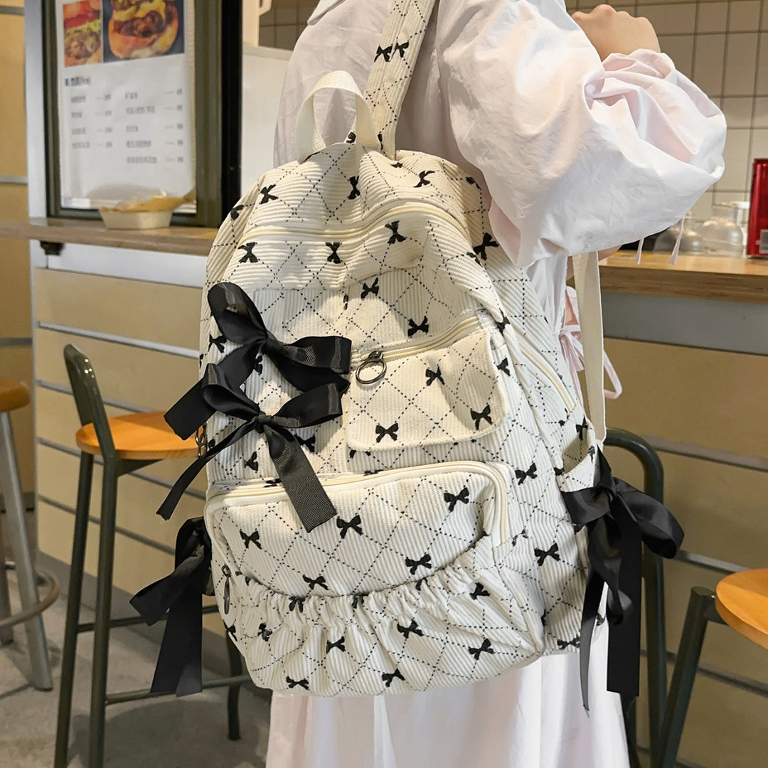 Verspielter Rucksack mit Schleifendetails und Praktischen Fächern Karnz