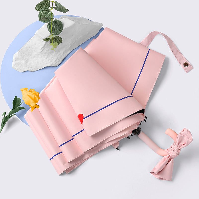 Damen eleganter Faltregenschirm mit herzförmigem Design Karnz