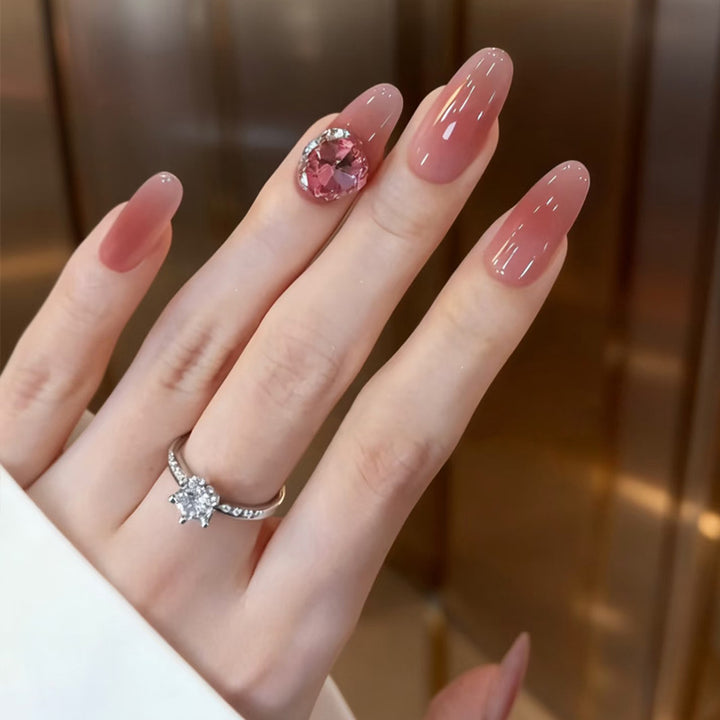 Elegante Press-On Nagelkunst mit Strassakzenten Karnz