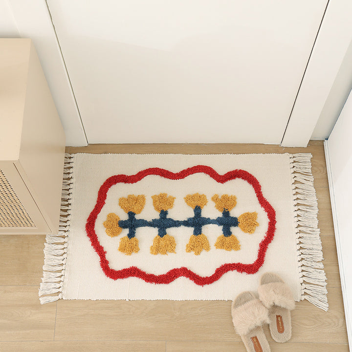Handgewebter Baumwoll-Badmattenteppich mit Tufting-Blumenapplikation und Quasten Karnz