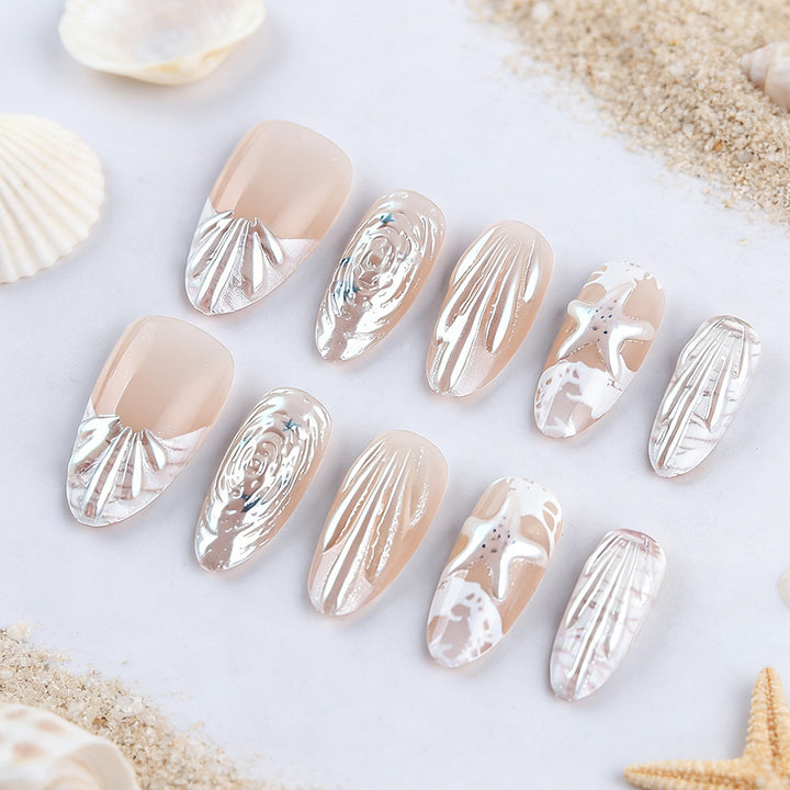 Künstlerisches ozeaninspiriertes Gel-Nägel-Design Karnz