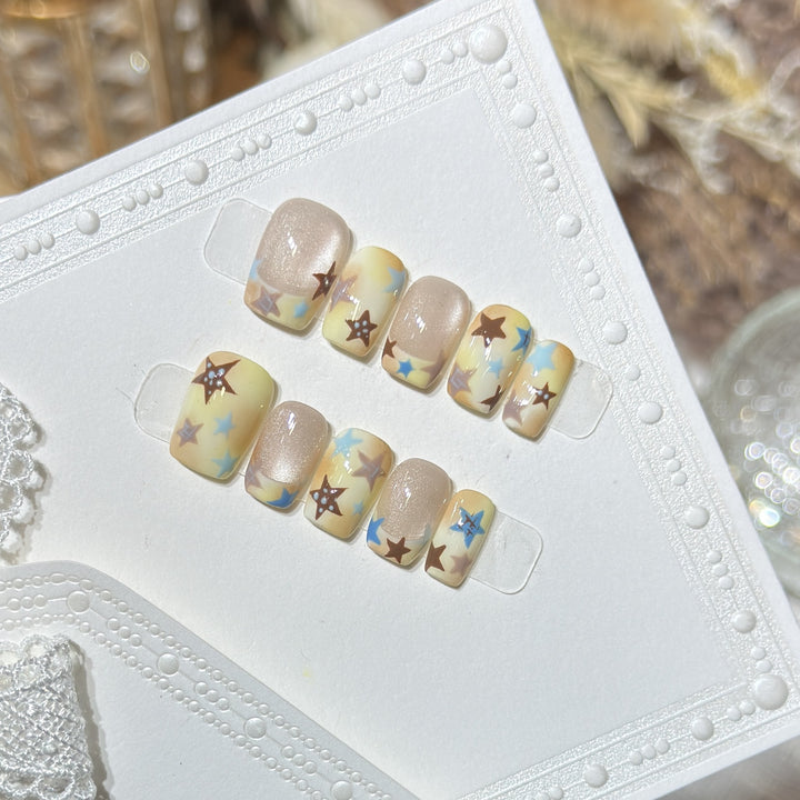 Press-On Nagelkunst Set mit Sterne Akzenten Karnz