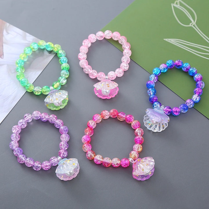 Verspieltes Armband mit Muschel-Anhänger Karnz