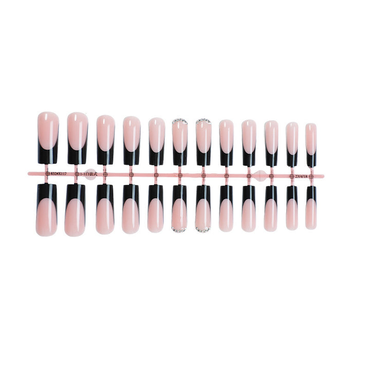 Kreatives Kunstnagelset mit eleganten Schwarz-Pink-Design Karnz