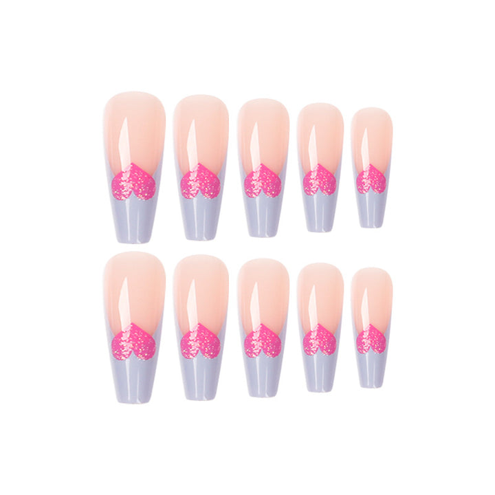 Kunstvolle Stiletto-Nägel mit bunten Herzmotiven Karnz