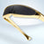 Damen Futuristische Designer-Sonnenbrille mit stilvollem goldenen Rahmen Karnz