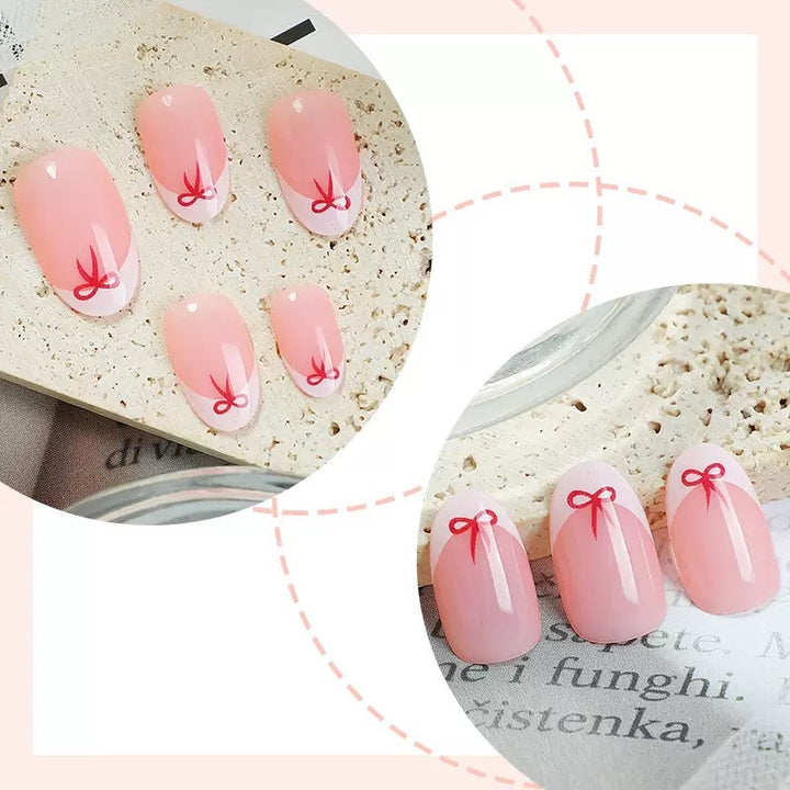 Kunstnagelset mit eleganten Schleifen und French-Spitzen Karnz