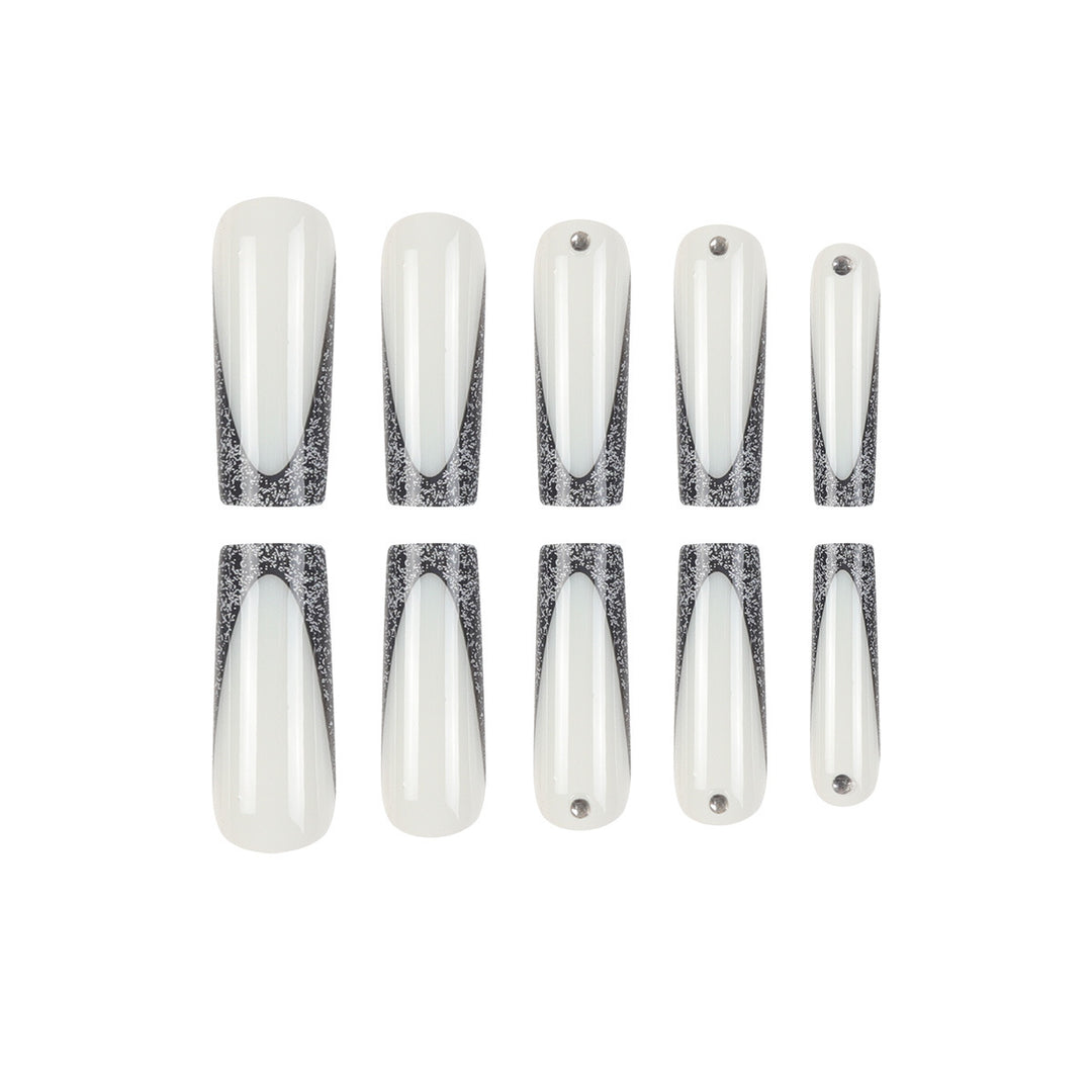 Elegante Stiletto Press-On Nägel mit glitzernden Spitzen Karnz