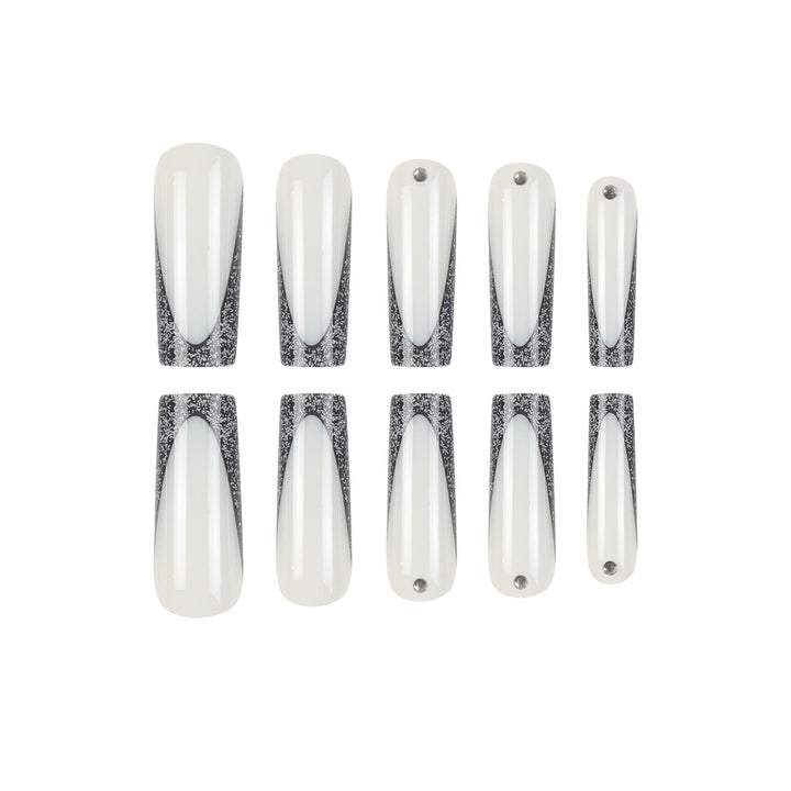 Elegante Stiletto Press-On Nägel mit glitzernden Spitzen Karnz