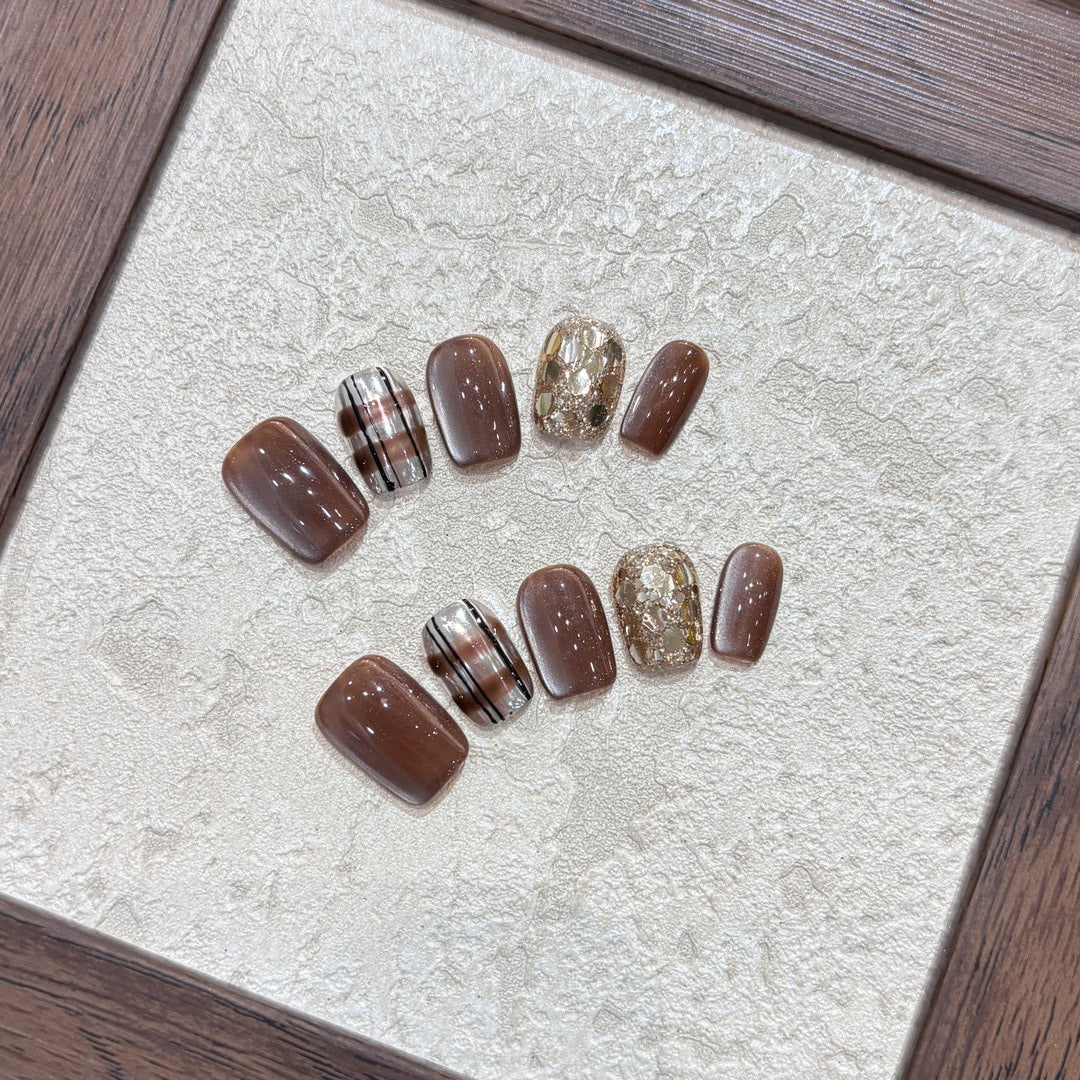Kunstnägel-Set mit Glitzer- und Goldakzenten Karnz