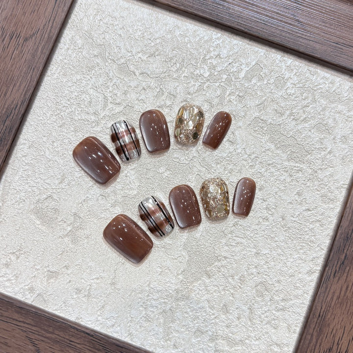 Kunstnägel-Set mit Glitzer- und Goldakzenten Karnz