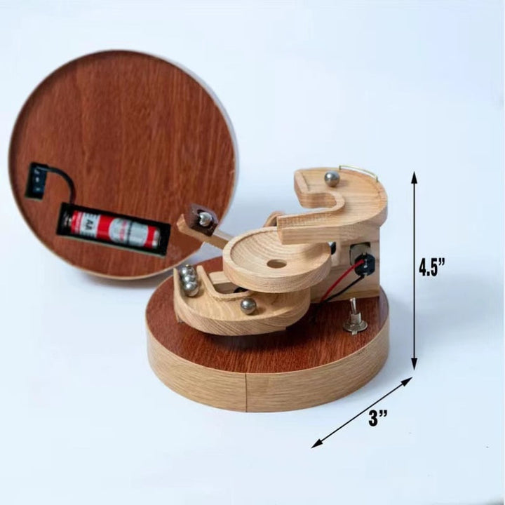 Karnz | Ewige Bewegung Holz-Marmor Maschine