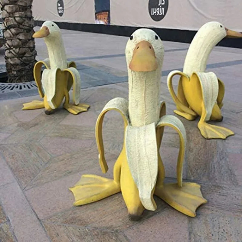 Bananenenten-Dekofigur – Verspielte Harzdekoration für drinnen und draußen