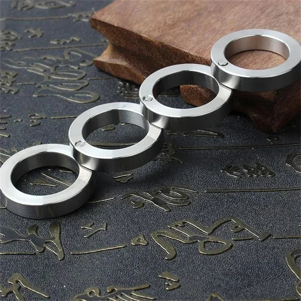 Karnz | Edelstahl Selbstverteidigung Rotierbarer Faltbarer Ring