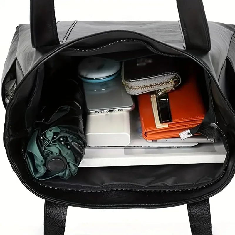 Elegante Schultertasche aus Leder im Retro-Stil mit glatter Oberfläche