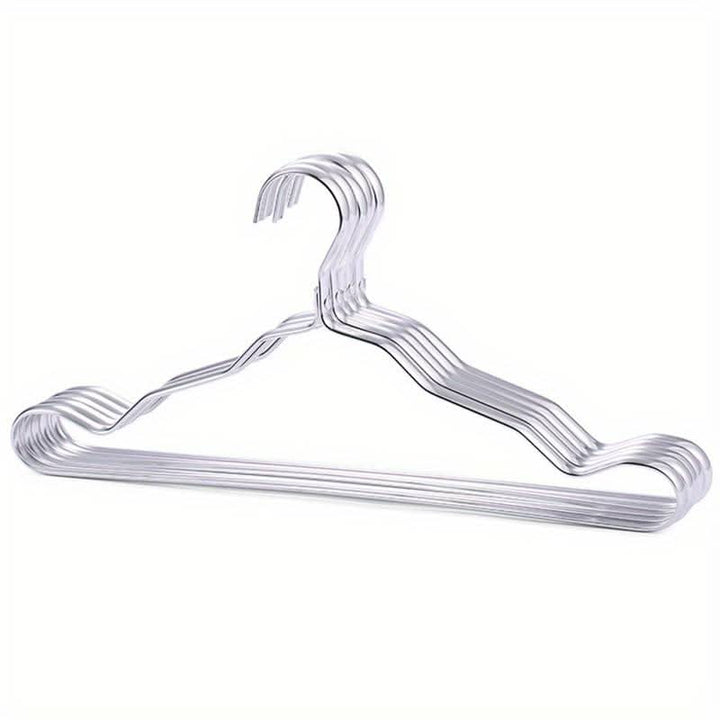 Hochwertige Kleiderbügel aus Messing für elegante Garderobe