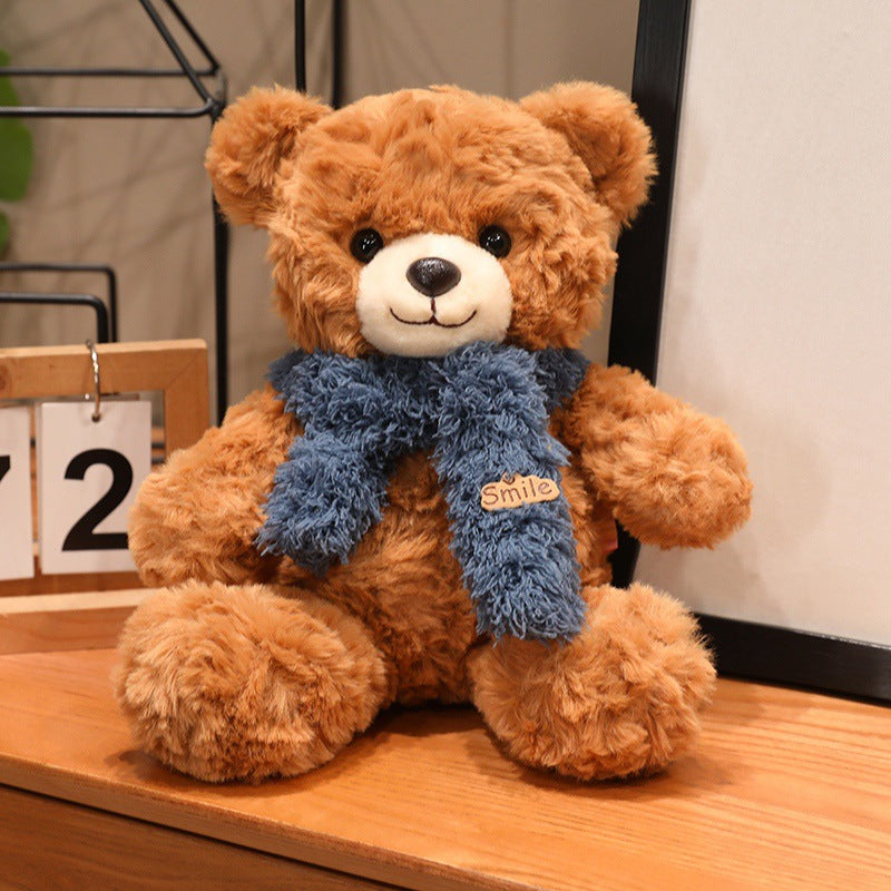 Großer Plüsch-Teddybär mit Seidenschleife
