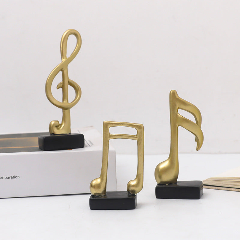 Drei Musiknoten-Figuren, Kunstharz, modern