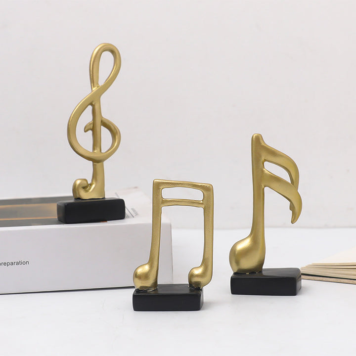Drei Musiknoten-Figuren, Kunstharz, modern