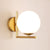 Moderne runde Wandlampe mit Glasglobus – Elegante Wandmontage für Schlafzimmer und Wohnzimmer | Karnz
