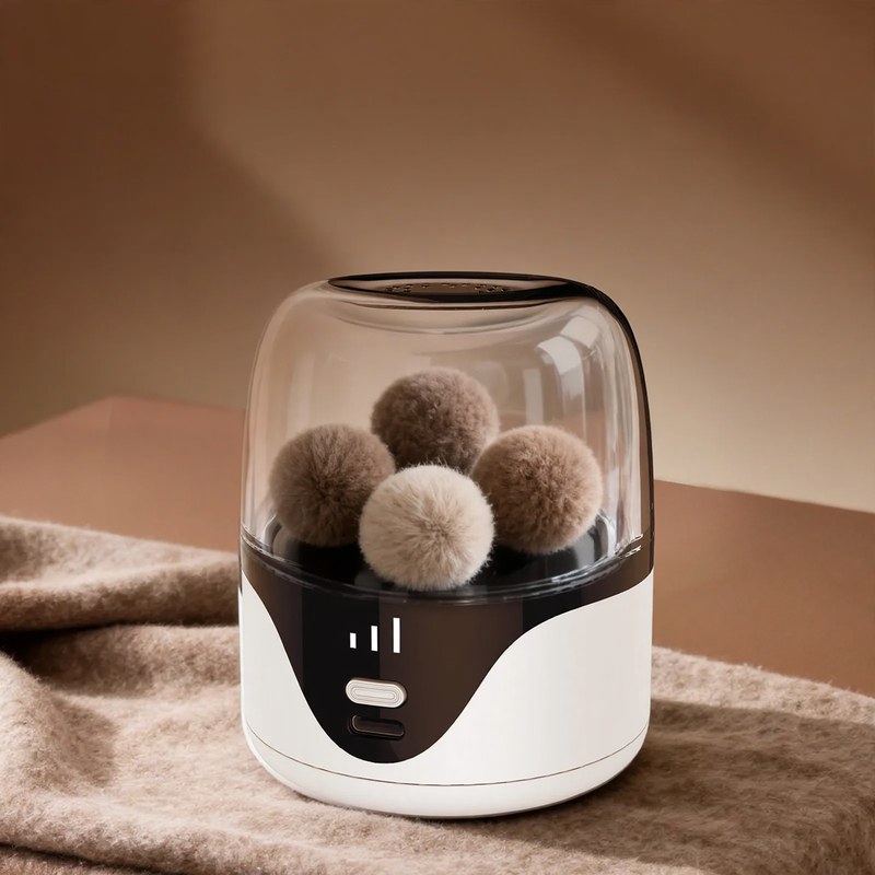 Tragbarer Fusselrasierer mit Aufladung