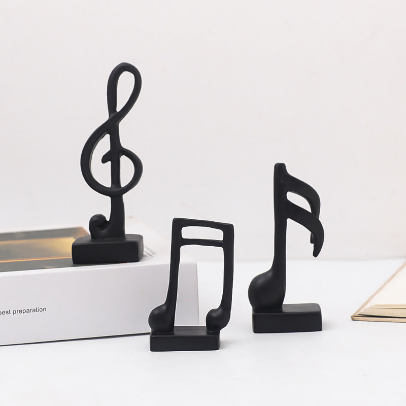 Drei Musiknoten-Figuren, Kunstharz, modern