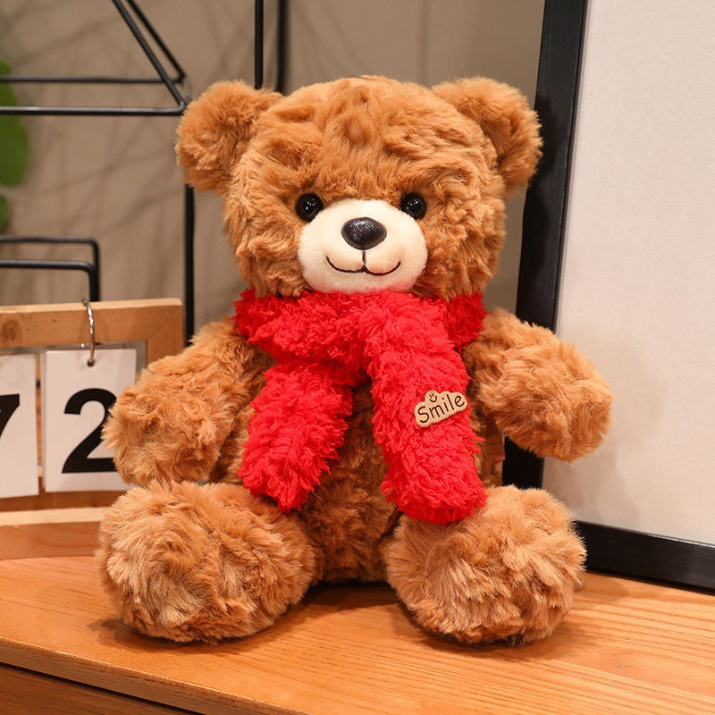 Großer Plüsch-Teddybär mit Seidenschleife