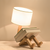 NordicLight – Skandinavische Tischlampe mit integriertem Bücherregal | Karnz