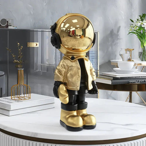Moderne zeitgenössische Astronautenstatue goldbeschichtete Harzdekoration | Karnz