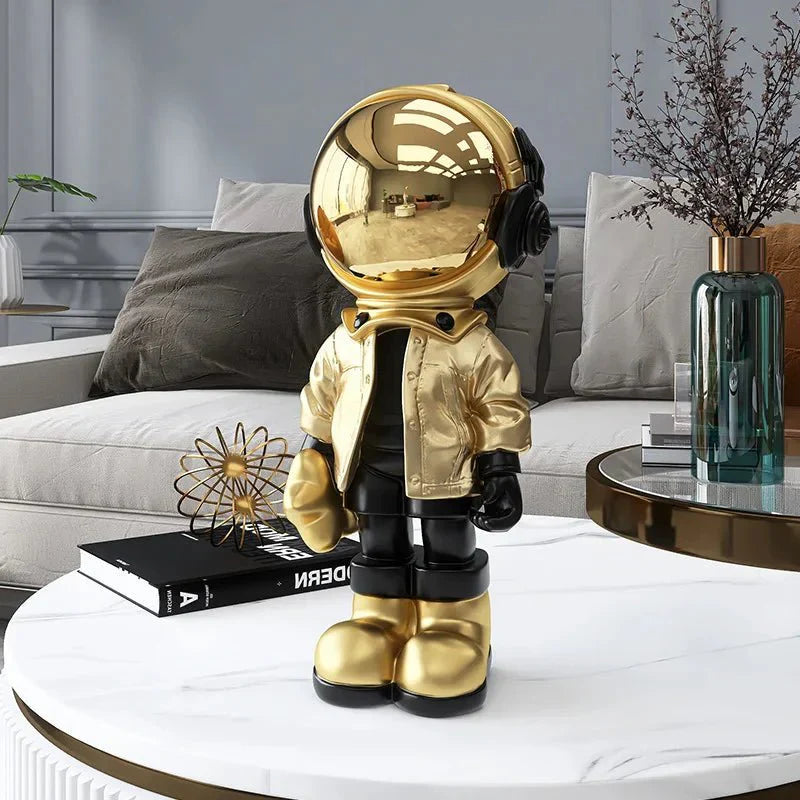 Moderne zeitgenössische Astronautenstatue goldbeschichtete Harzdekoration | Karnz