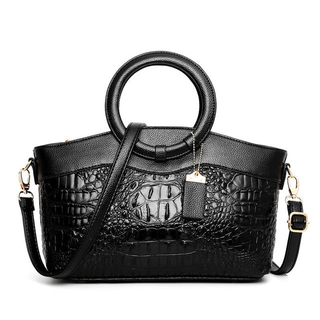 Krokodilledertasche – mit handgefertigten Details