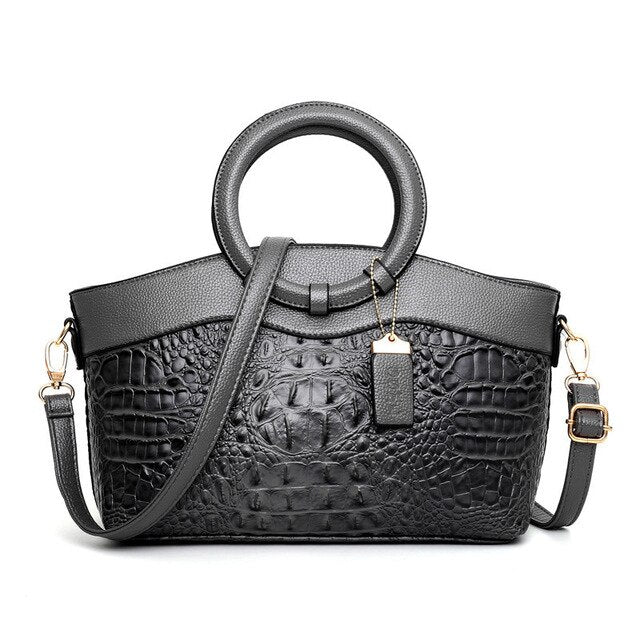 Krokodilledertasche – mit handgefertigten Details
