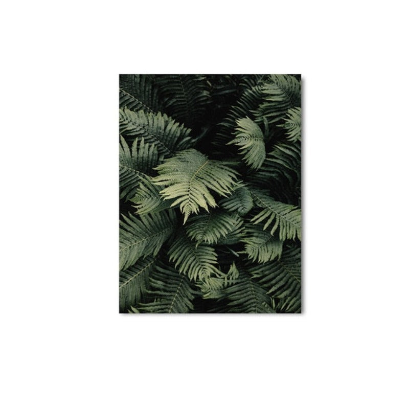 Modernes Wandbild mit dunkelgrünen Blättern