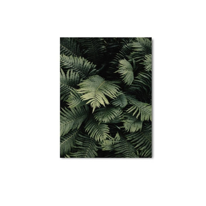 Modernes Wandbild mit dunkelgrünen Blättern